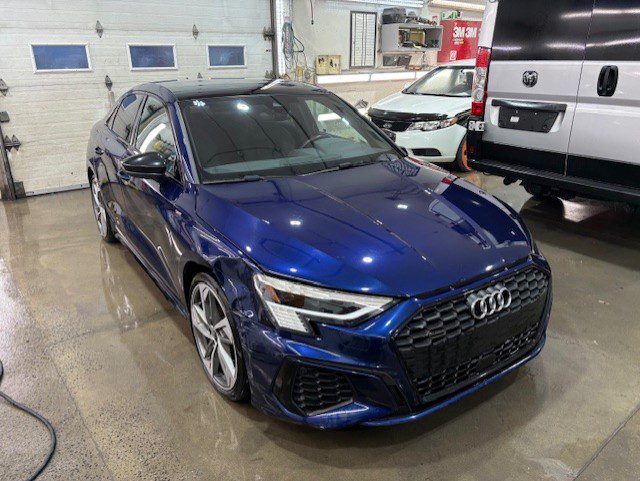 Réparation carrosserie Audi A3 2022 à Saint-Jean-sur-Richelieu : aile avant droite, pare-chocs, phare et côté droit